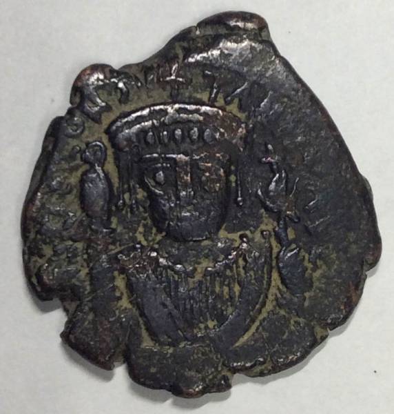 Монета Византии Фоллис Тиберий II Константинополь 578-582 гг. Монета Византии Фоллис Тиберий II Константинополь 578-582 гг.