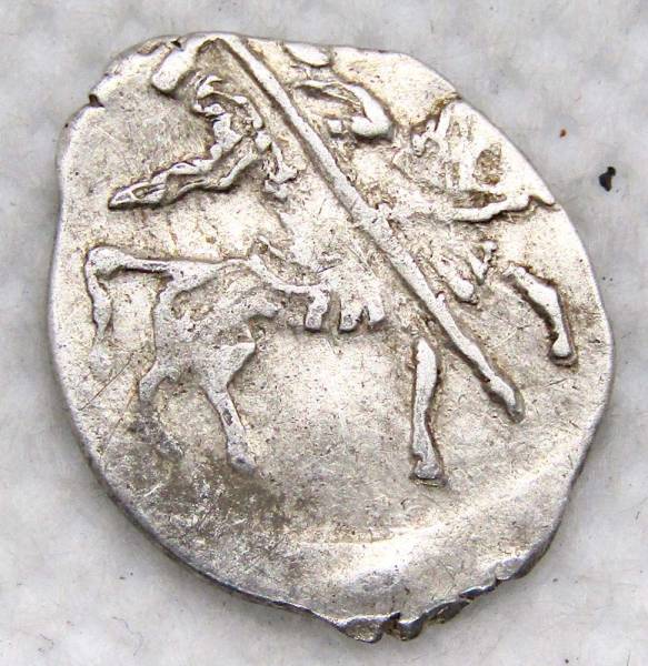 Копейка серебро Василий Шуйский (чешуя), 1606-1610 гг. Московский денежный двор Копейка серебро Василий Шуйский (чешуя), 1606-1610 гг. Московский денежный двор