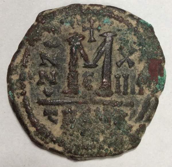 Монета Византии Фоллис Маврикий Тиберий 596 год Антиохия Монета Византии Фоллис Маврикий Тиберий 596 год Антиохия