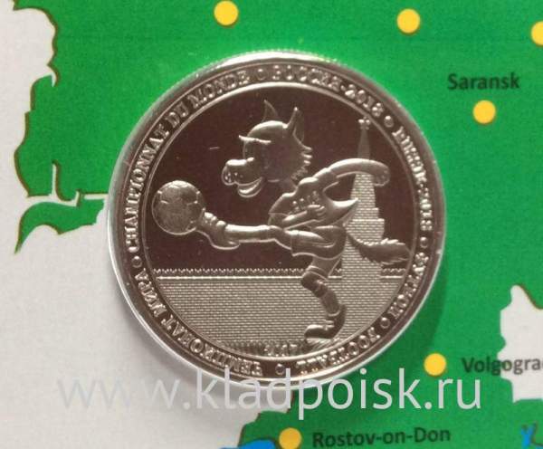 Монета 100 франков Буркина Фасо в оригинальном буклете ЧМ по футболу 2018 года. Талисман чемпионата «Волк Забивака»