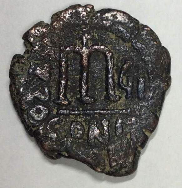 Монета Византии Фоллис Тиберий II Константинополь 578-582 гг. Монета Византии Фоллис Тиберий II Константинополь 578-582 гг.